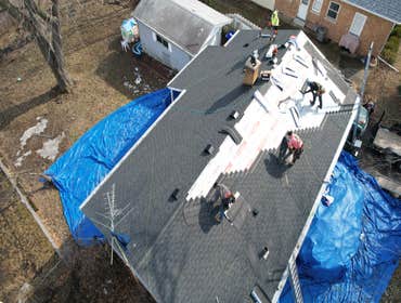 Photos by Allmax Roofing #2 Old roof had a few ongoing leaks, caused large areas of decking to rot, we replaced decking then installed a GAF roof syste