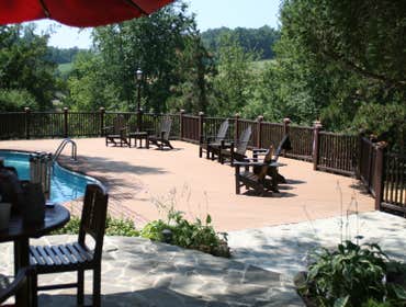 Trex deck with hardscape stone patios with landsca