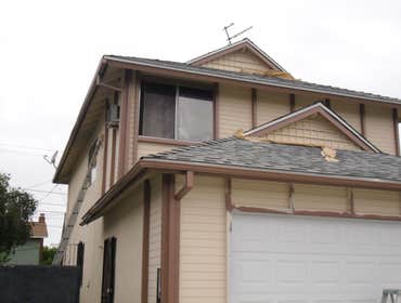 RESIDENTAL EXTERIOR A HOUSE EXTERIOR REPAIR AND PAINT