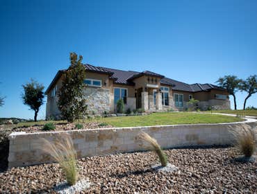 Custom Stone and Stucco Transitional Residence We love working with sophisticated clients. The homeowners, a nurse and a metallurgical engineer, purcha