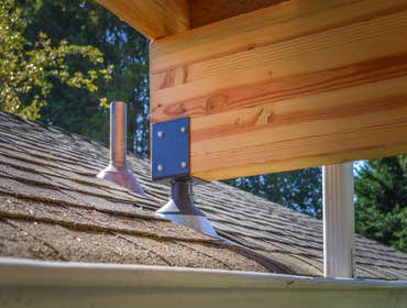 Suntuf Courtyard Patio Cover with SkyLift Roof Risers This Suntuf patio cover is installed over a small courtyard and attached to two roof-lines using 