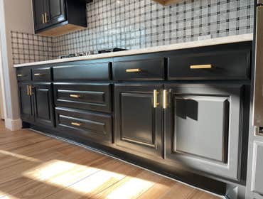 Photos by Austin Fine Finish Painting LLC #1 46 Piece Cabinet repaint. Benjamin Moore Satin Impervo color matched to SW Tricorn Black. Photos taken d