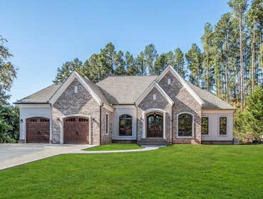 The Argyle Heights Manor This Luxury Experience custom home is where French Country meets Traditional design in an open concept, one story home with go