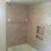 All Skill Construction, LLC Project new tub, ceramic tile, and painting.