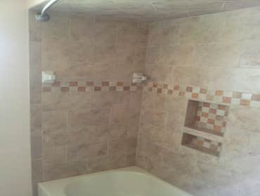 All Skill Construction, LLC Project new tub, ceramic tile, and painting.