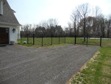 Sentinal black aluminum in Malvern This is a beautiful 54 inch black aluminum fence with swing out self closing estate gates with magnetic latches. Al