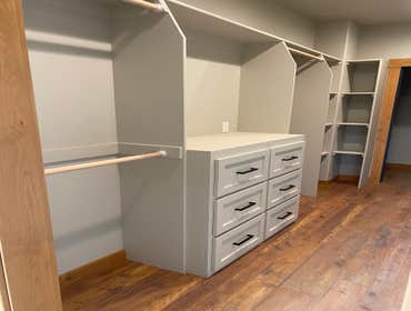 Photos by Creative Woodworks LLC #3 New build interior trim package. On this package alder was stained prior to installation. Custom closets, pantry, f