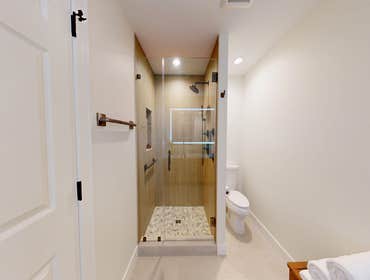 Moe's Full Home Makeover ✨ A spa-like retreat right at home.
This bathroom transformation features a sleek walk-in shower with warm vertical tile, a n