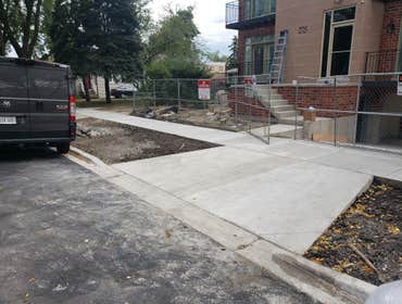 CONCRETE APRON AND SIDEWALK ( BUDD ST. / RIVER GROVE ) For this new construction project we had the pleasure to help installing the concrete driveway a