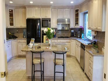 Kitchen Refinishing and new quartz counter top Kitchen Refinishing and new quartz counter top, New carpet, new paint, electrical.