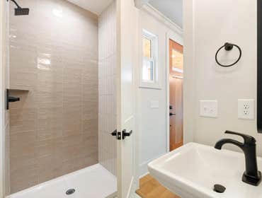 Close up of the stainless prostyle range and subway tile backsplash in the kitchen at 1135 Delmas Ave, East Nashville by CJMC Build.