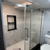 Photos by Eagle Construction & Remodeling Corp #1 Finish basement with a bathroom