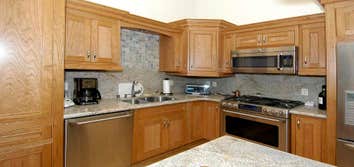 Various custom cabinet projects in the Reno - Sparks area Custom Kitchens, Bars, Ceiling Beams, Wine Cellars, Media Centers, Libraries, Home Office Wor