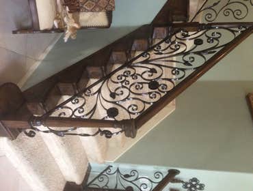 Hand forged staircase railing.