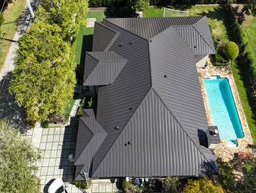 Photos by Gold Star Miami Corp #1 metal roof panels all are . 25 years warrantee
