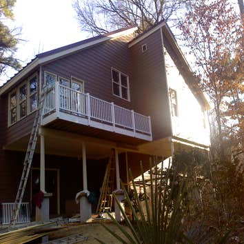 Lyndee Construction, Inc Large home addition This family in Raleigh, NC had grown out of their home. They had invested greatly in the landscaping of t