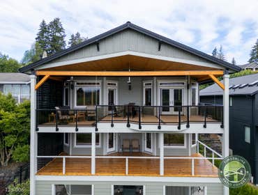 Burger Project This project brought together a full deck rebuild and custom patio cover designed to seamlessly integrate with the home’s existing struc
