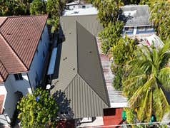 Photos by Gold Star Miami Corp #1 metal roof panels all are . 25 years warrantee