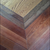 Hardwood Floor Neat work forming flooring lines.