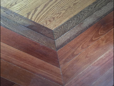 Hardwood Floor Neat work forming flooring lines.
