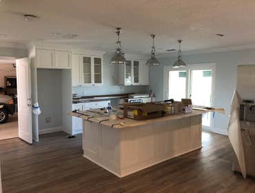 Fernandina Beach - 1970 home remodel (before & after) Demo existing kitchen and baths, tear out flooring to replace plumbing, new flooring throughout, 