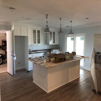 Fernandina Beach - 1970 home remodel (before & after) Demo existing kitchen and baths, tear out flooring to replace plumbing, new flooring throughout, 