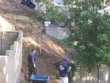 Hillside Construction Work Working on a hillside requires extra skills. Alot has to do with controlling water flow from heavy rains. Are you ready to e