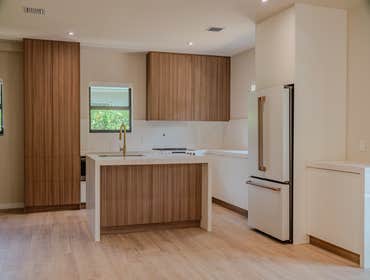 Coral Gables Home Renovation This Coral Gables residence underwent a full luxury transformation designed to expand living areas, modernize functionalit