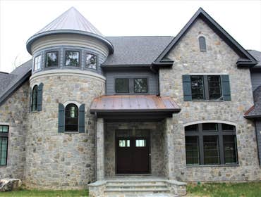 Stone veneer with a turret