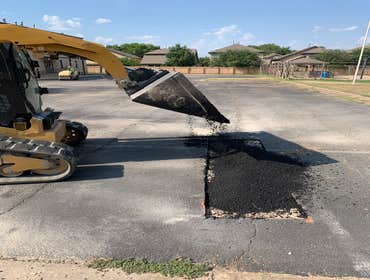 Parking lot asphalt patching