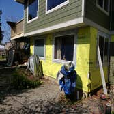 Siding Department Rural Home Full REside in JamesHardie 7" reveal Color+, With JamesHardie Trim, and Double Window Replacement.