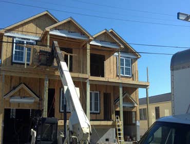 Photos by Teagan Homes #1 New construction of two townhomes sold to individuals for about $450000 each unit. Profit margin was over $250,000 in less th