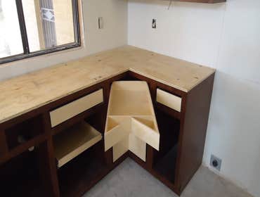 Custom Woodwork Specialties Inc Custom cabinets and doors, all types of interior moldings from base to crown and wainscoting