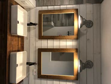 Photos by Elite Building and Remodeling #1 Rustic Bathroom
