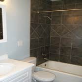 Rental property rehab Complete renovation including roofing, siding, windows, doors, kitchen, bathrooms, tile, hardwood flooring, trim work, and painti