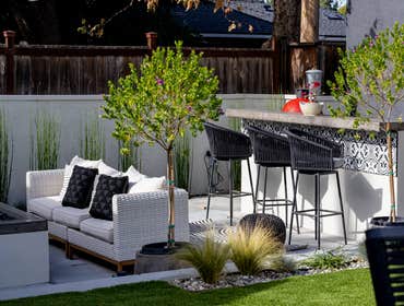 Avonbury Outdoor Living & BBQ Area Transform your backyard into a stylish outdoor haven with our expertly designed landscape and BBQ setup. This projec