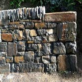 Dry Stone Walling project of Borrowed Ground Each dry stone walling project is built by professional dry stone masons. We specialize in building high q