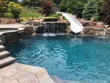 Swimming Pool with Waterfall & Slide in Doylestown, PA