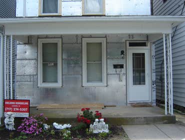 Swank Home Makeover A 2.5 story, single-family home: Siding, windows, insullation, soffit, fascia, capping. Also, repaired fence damage, installed new
