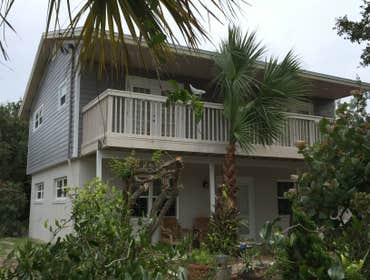 New Smyrna Beach Resisdential Renovation Complete exterior renovation to include hardy board siding, painting and soffit. Demo and install new second 