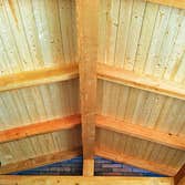 Covered deck roof structure