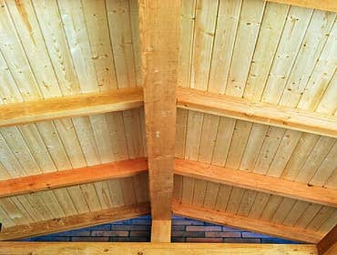 Covered deck roof structure