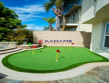 Artificial turf putting green