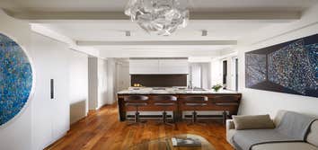 West 23rd NYC - 1 Bedroom Apartment Renovation This project combines two existing studio apartments into a compact 800 sqft. live/work space for a youn
