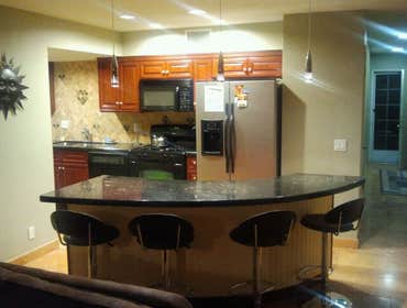 Project photos from Mikeco Inc Dba Oak Tree Construction Beach condo kitchen remodel.