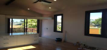 809 Bush St Ground Up 850 SF building raised on steel columns. Two level mangaris deck and staircase. New wood flooring, kitchen and restroom.