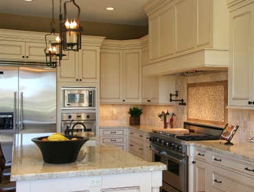 Traditional Kitchen This is a traditional kitchen remodel in Los Angeles.New kitchen cabinets, new appliances, new counter-tops, new lighting, tile bac