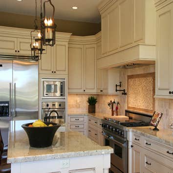 Traditional Kitchen This is a traditional kitchen remodel in Los Angeles.New kitchen cabinets, new appliances, new counter-tops, new lighting, tile bac