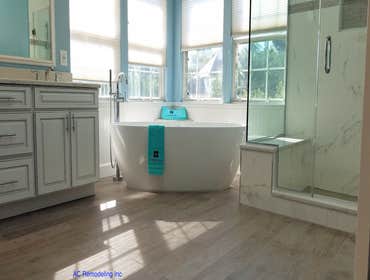 Inspiring spa like Master bathroom This contemporary spa like bathroom with free standing soaking bathtub and full natural light was completely renovat