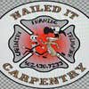Nailed It Carpentry logo